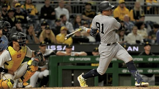 After a scare on field, Bae's throwing error costs Pirates against Yankees taken at PNC Park (Pirates)